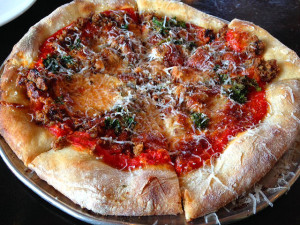 Lamb, Kale, Arrabbiata, Mozzarella, and Pecorino Pizza